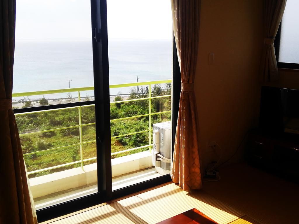 Kariyushi Condominium Ocean Hills Chouraku Stay Kin Exteriör bild