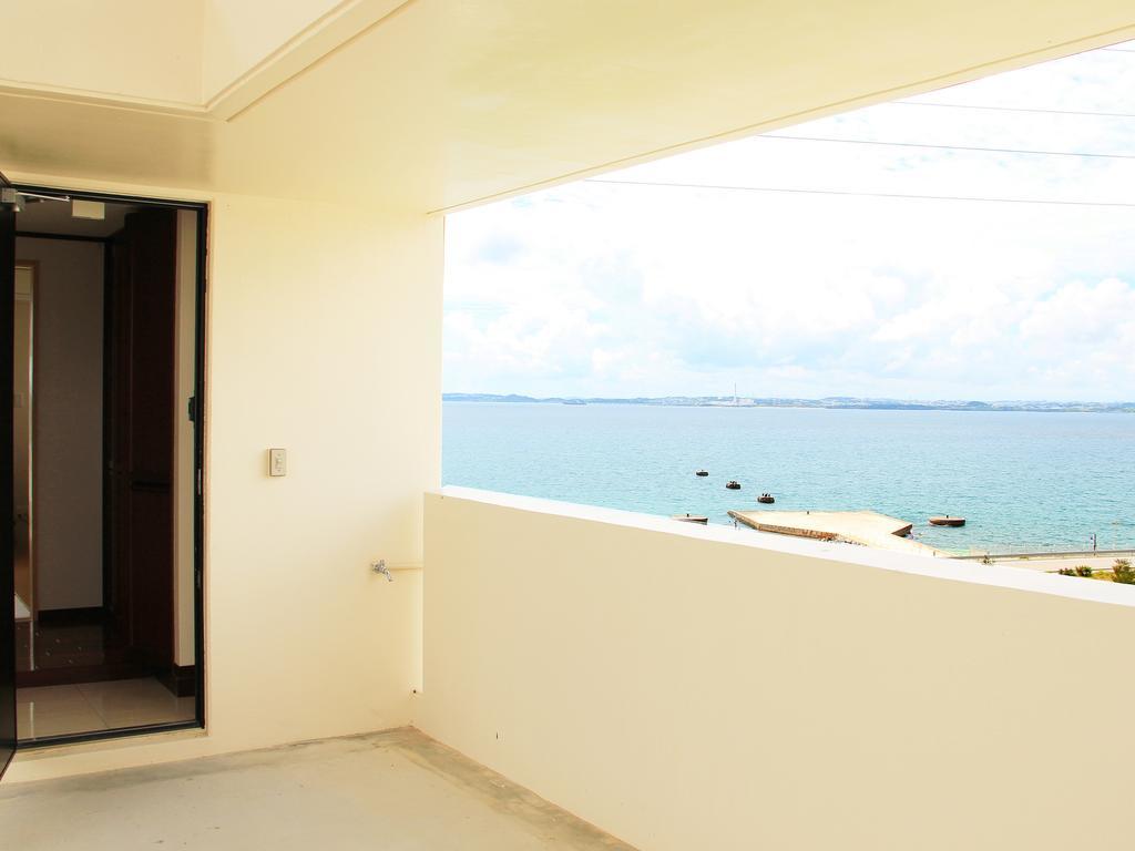 Kariyushi Condominium Ocean Hills Chouraku Stay Kin Exteriör bild